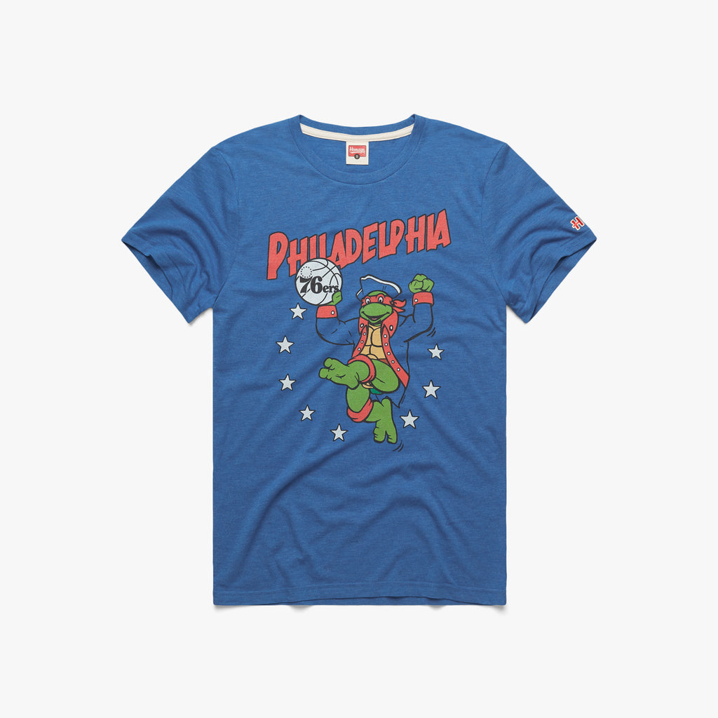 TMNT Raphael x New Orleans Pelicans T-Shirt from Homage | Grey | Retro Nickelodeon T-Shirt from Homage.