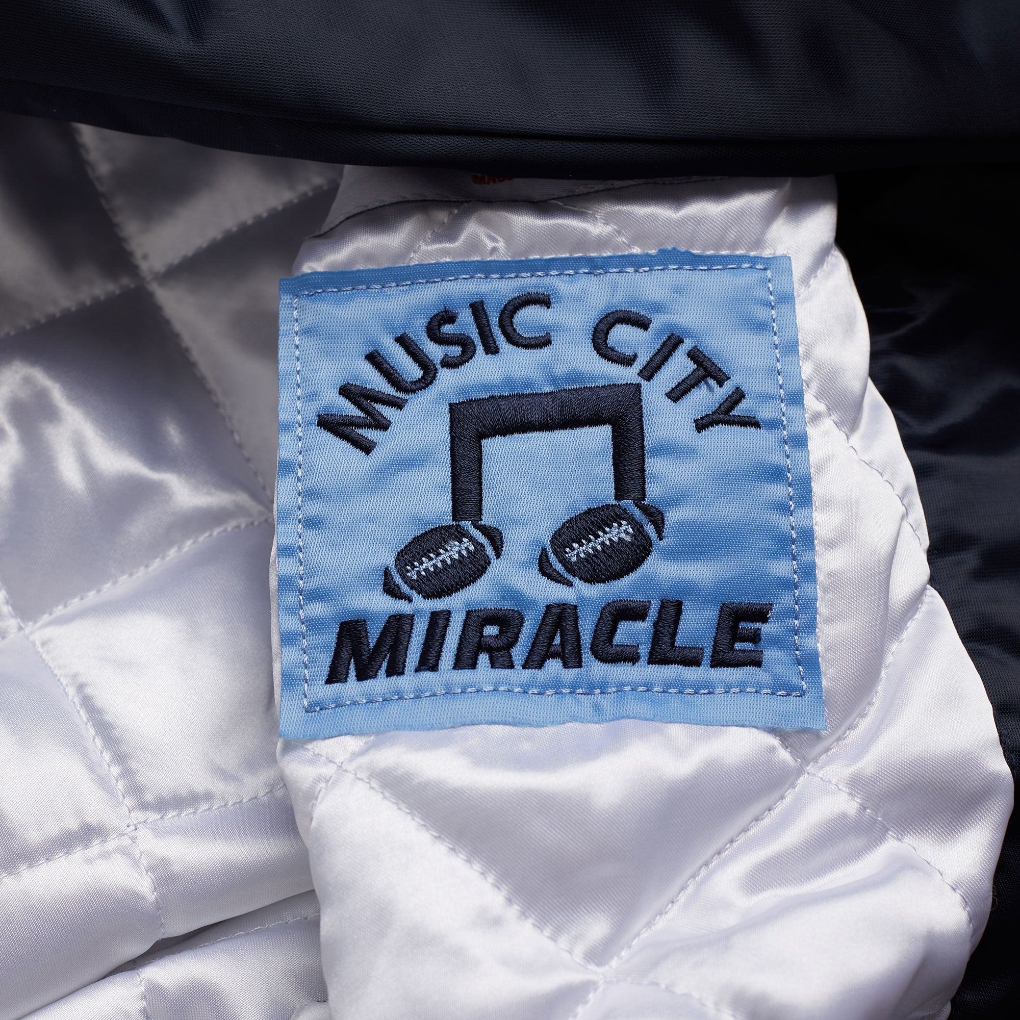 Homage launches NFL Starter jacket line Titans - Music City Miracles