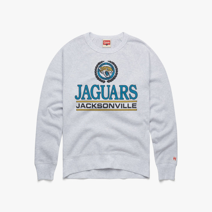 Jacksonville Jaguars Crest Crewneck from Homage. | Officially Licensed Vintage NFL Apparel from Homage Pro Shop.